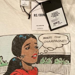 BNWT : Womens Re  / Done 70’s Loose Tee . Says “ WAIT ! The CHAMPAGNE !! “